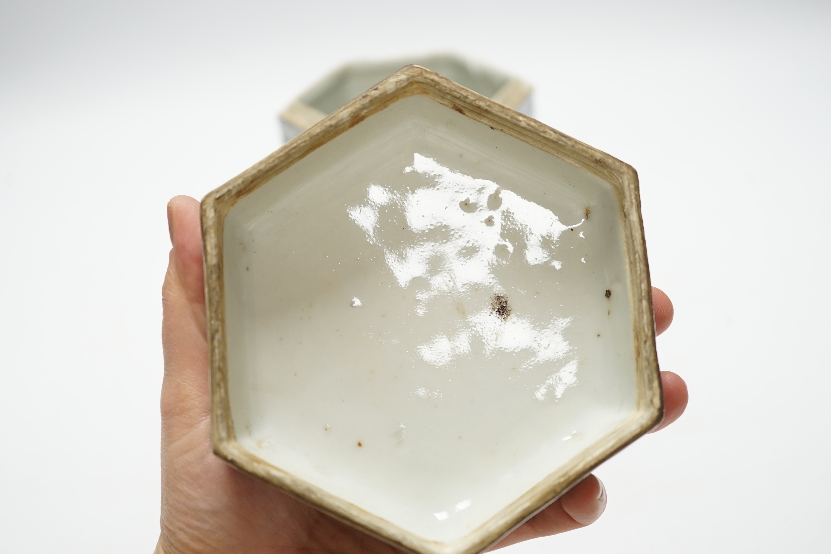 A late 19th century Chinese blue and white hexagonal jar and cover, 14cm